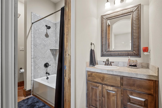 bathroom featuring vanity and shower / tub combo with curtain