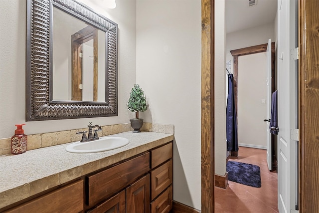 bathroom featuring vanity and tile patterned flooring