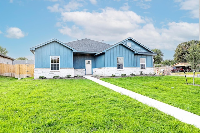 1412 Mason St, Bowie, TX 76230 - view of front facade featuring board and batten siding and a shingled roof