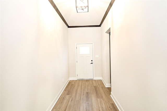 1412 Mason St, Bowie, TX 76230 - doorway featuring light wood finished floors, baseboards, and crown molding