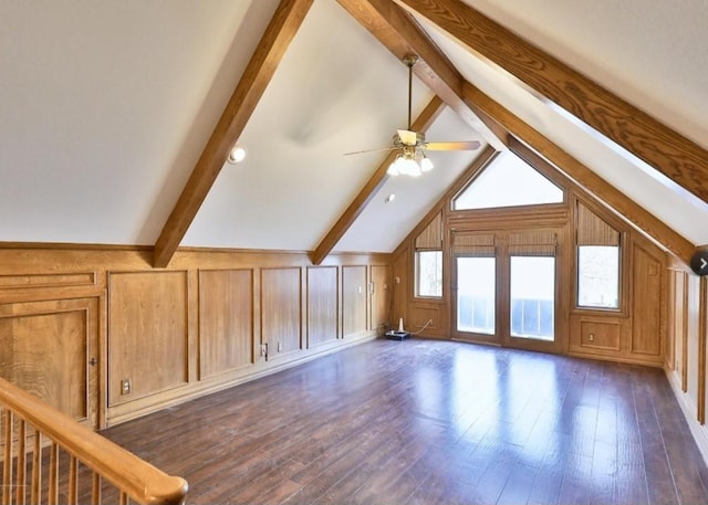 bonus room with dark wood-style flooring, a ceiling fan, and lofted ceiling with beams