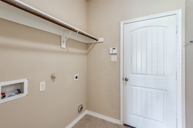 clothes washing area with electric dryer hookup and washer hookup