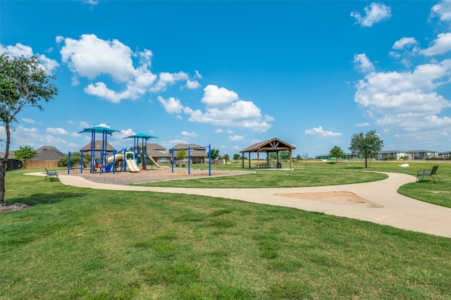 view of play area featuring a gazebo and a lawn