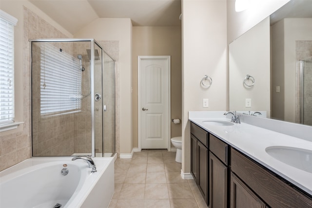 full bathroom featuring vanity, tile patterned floors, independent shower and bath, and toilet