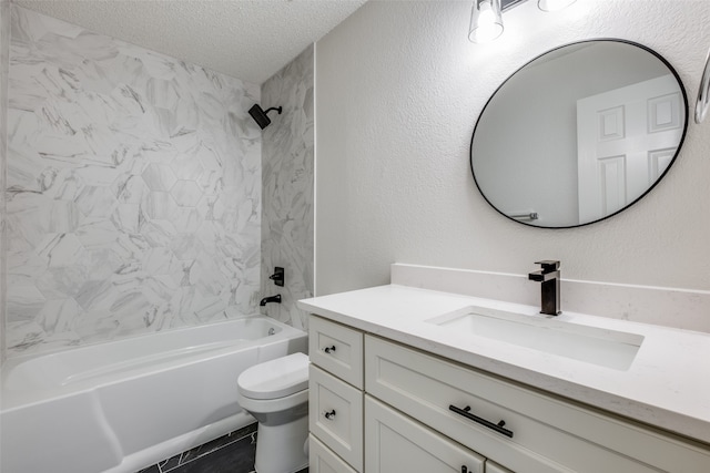 full bathroom with a textured ceiling, tiled shower / bath, toilet, vanity, and tile patterned floors