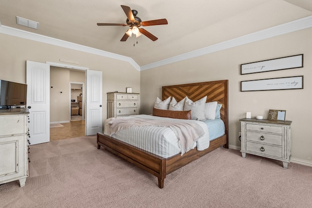 bedroom with crown molding, light colored carpet, lofted ceiling, and ceiling fan