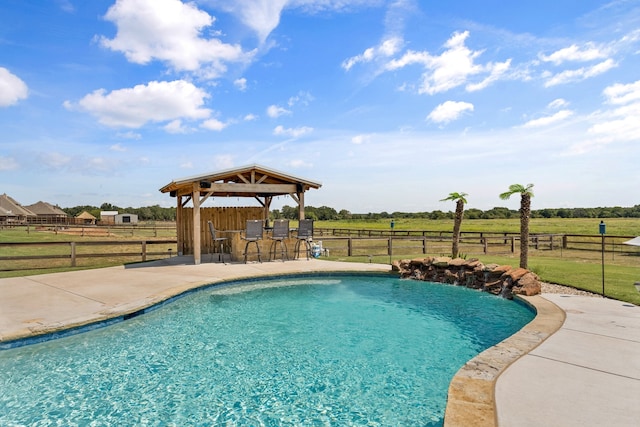 view of swimming pool with a gazebo