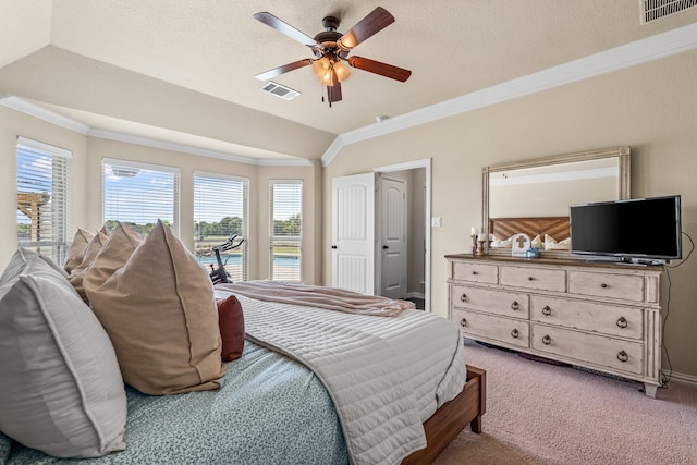 carpeted bedroom featuring access to exterior, ornamental molding, and ceiling fan