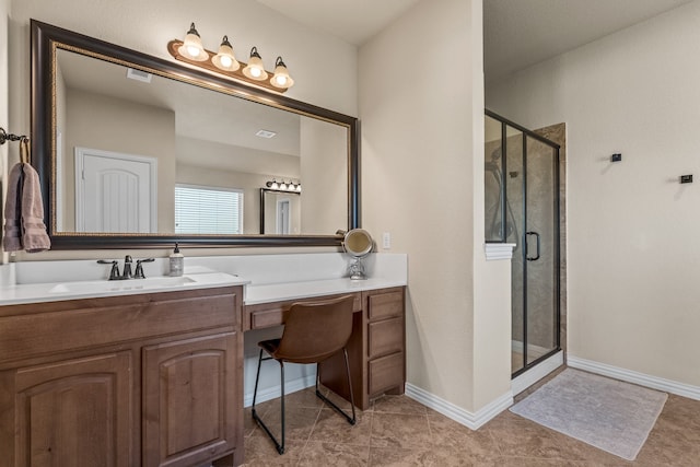 bathroom with walk in shower, tile patterned flooring, and vanity