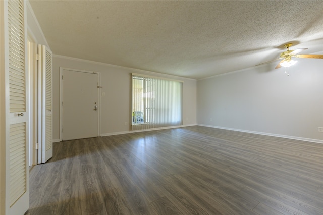 spare room featuring wood-type flooring, a textured ceiling, crown molding, and ceiling fan