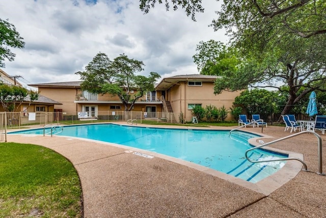 view of pool featuring a patio area