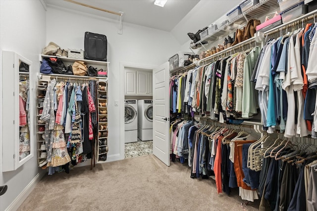 spacious closet featuring carpet and independent washer and dryer