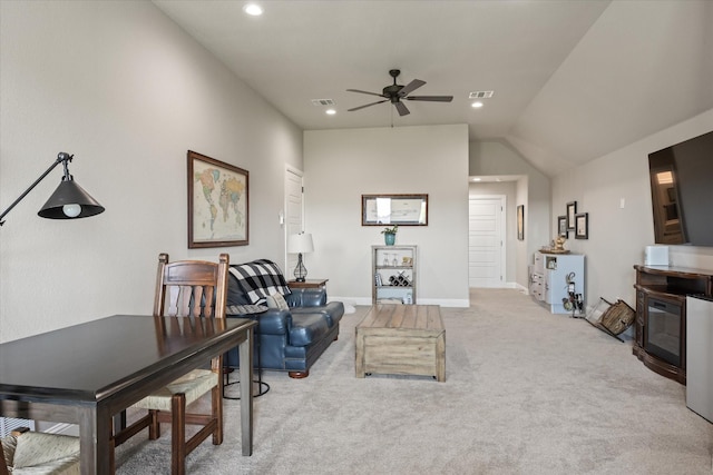 carpeted living room with vaulted ceiling and ceiling fan