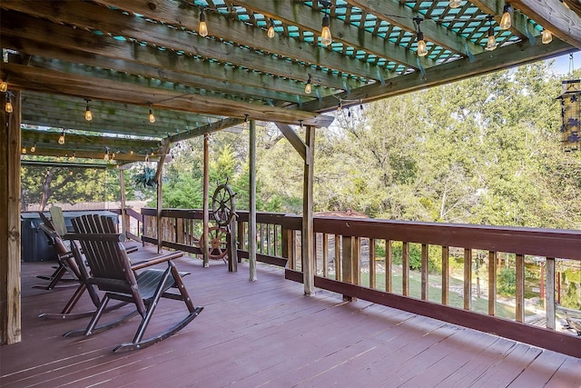 wooden terrace with a pergola