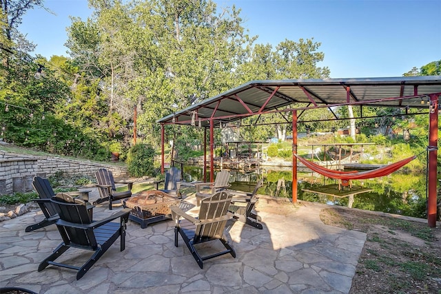 view of patio featuring a fire pit