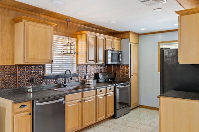 kitchen with black appliances, pendant lighting, light tile patterned floors, sink, and decorative backsplash