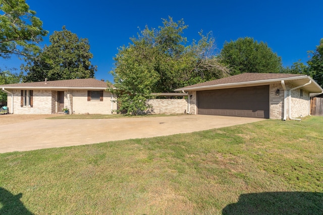 single story home with a garage and a front yard