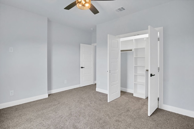 unfurnished bedroom featuring ceiling fan, carpet flooring, and a closet