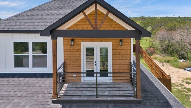 property entrance featuring french doors