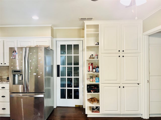 kitchen featuring dark hardwood / wood-style flooring, stainless steel refrigerator with ice dispenser, white cabinets, and crown molding