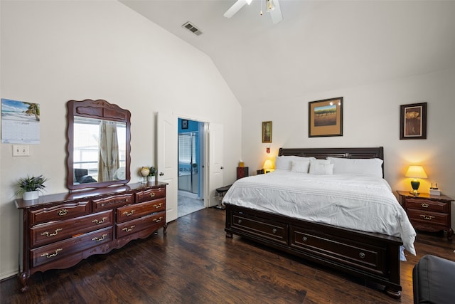 bedroom with high vaulted ceiling, dark hardwood / wood-style floors, ceiling fan, and ensuite bathroom