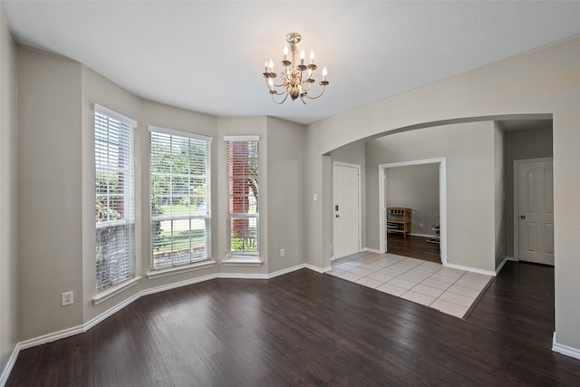 interior space with an inviting chandelier and a healthy amount of sunlight