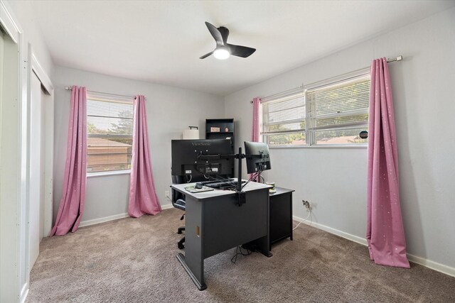 home office with carpet floors and ceiling fan