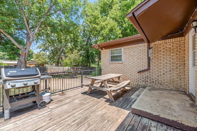 wooden deck with grilling area