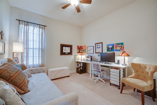 home office with ceiling fan and light colored carpet