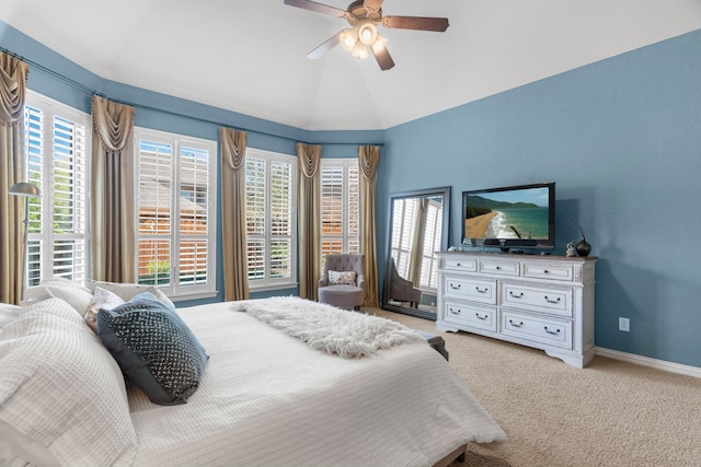 carpeted bedroom featuring ceiling fan and lofted ceiling