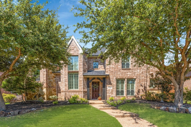 view of front of home with a front yard