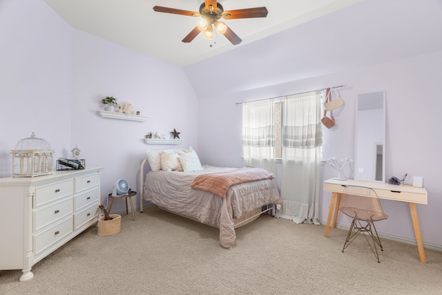 bedroom with ceiling fan, light colored carpet, and lofted ceiling