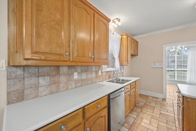 kitchen with sink, backsplash, a notable chandelier, ornamental molding, and stainless steel dishwasher