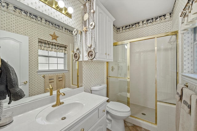 bathroom with walk in shower, vanity, toilet, and tile patterned flooring