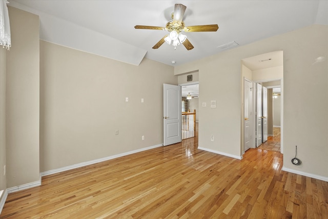 unfurnished bedroom with ceiling fan and light wood-type flooring