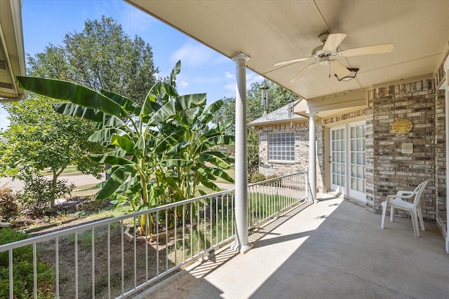 view of patio / terrace featuring a balcony and ceiling fan