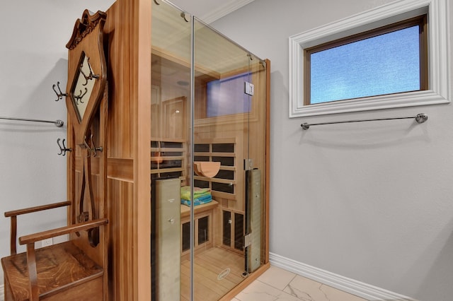 bathroom with crown molding