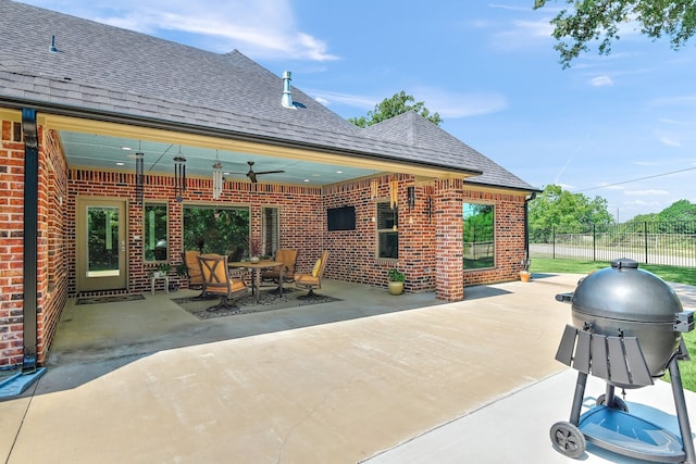 view of patio / terrace with a grill and ceiling fan