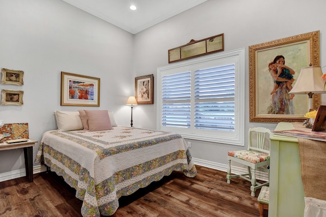 bedroom with dark wood-type flooring