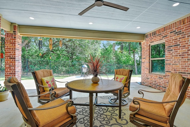 view of patio featuring ceiling fan