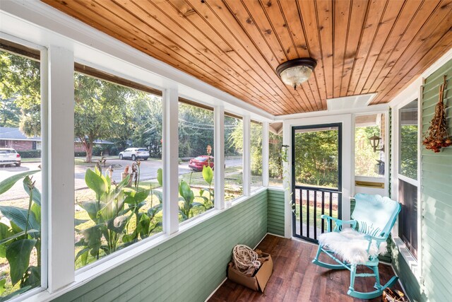 sunroom with wooden ceiling