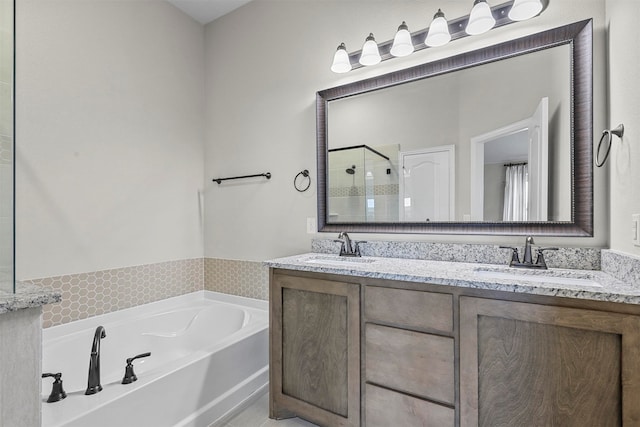 bathroom with vanity and plus walk in shower