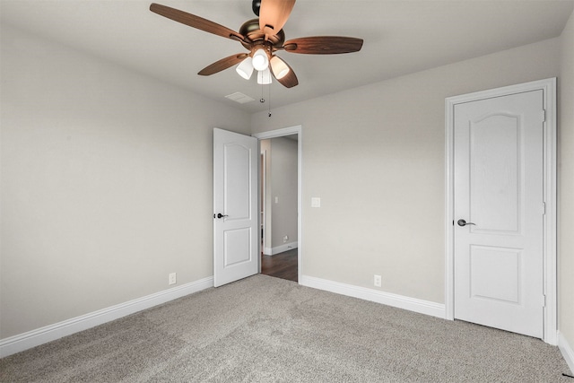 unfurnished bedroom with carpet and ceiling fan