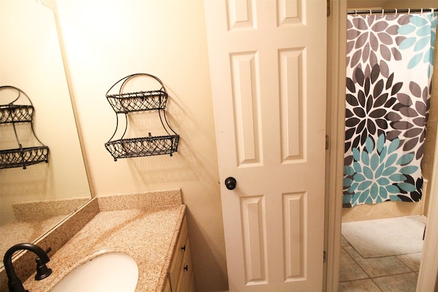 bathroom featuring vanity and tile patterned flooring