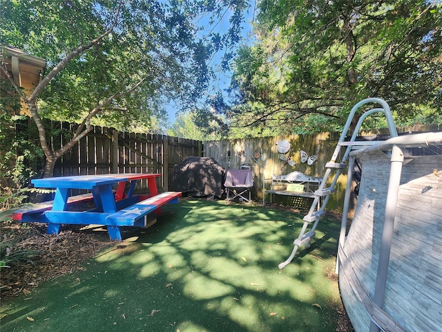 view of yard featuring a deck