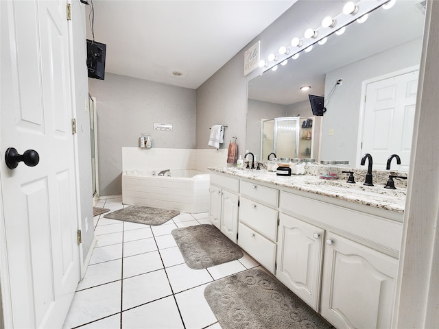 bathroom featuring vanity, separate shower and tub, and tile patterned flooring