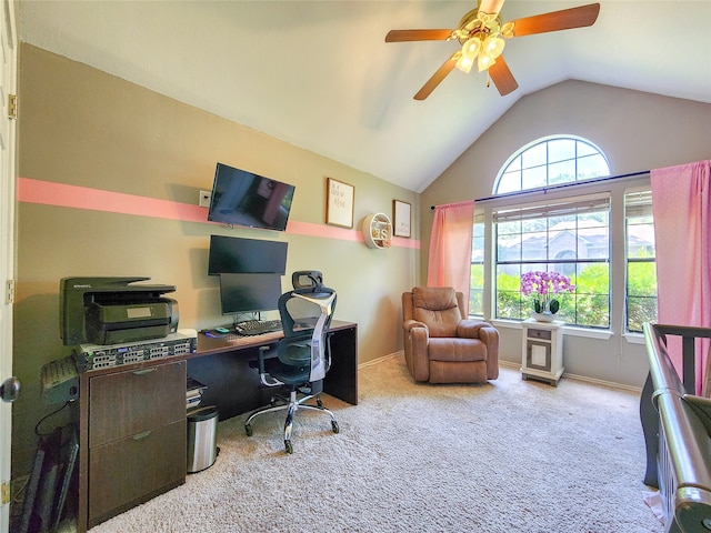 carpeted office space with ceiling fan, a healthy amount of sunlight, and lofted ceiling