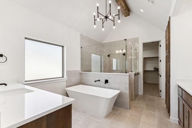 bathroom featuring an inviting chandelier, tile patterned flooring, lofted ceiling with beams, vanity, and independent shower and bath