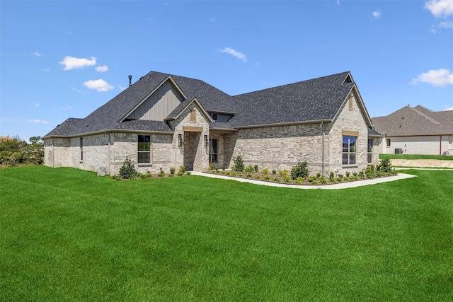 french country inspired facade featuring a front lawn