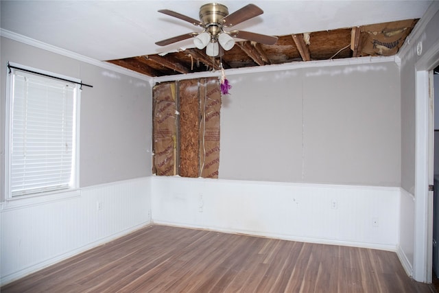 unfurnished room featuring ceiling fan, crown molding, and wood-type flooring